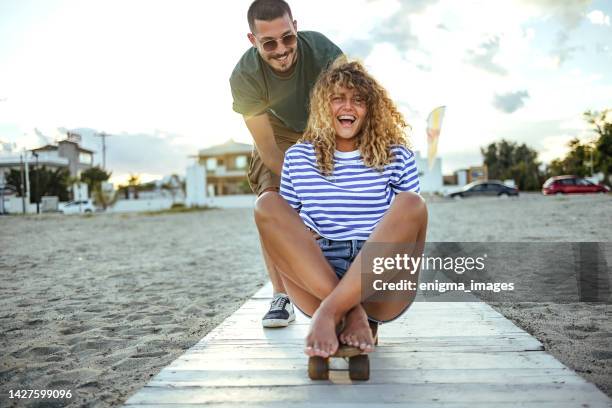 young and in love - couple skating stock pictures, royalty-free photos & images