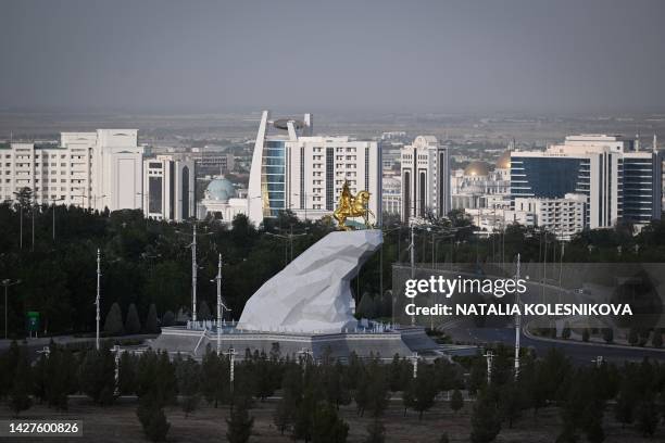 View shows the Golden Horse Monument featuring former Turkmen leader Gurbanguly Berdymukhamedov riding an Akhal-Teke, Turkmenistan's national horse,...