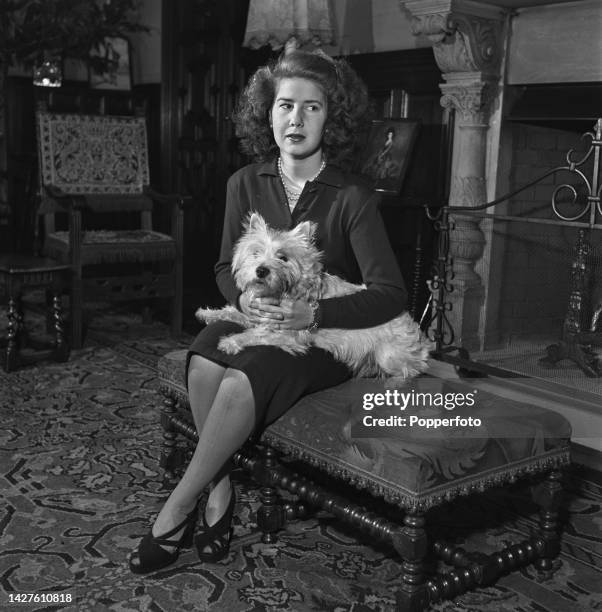 Cayetana Fitz-James Stuart y Falco, daughter of the Duke of Alba, Spain's ambassador in London, posed with her West Highland terrier Pammy in the...