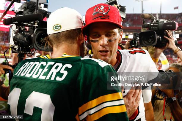 Aaron Rodgers of the Green Bay Packers talks with Tom Brady of the Tampa Bay Buccaneers after the game at Raymond James Stadium on September 25, 2022...