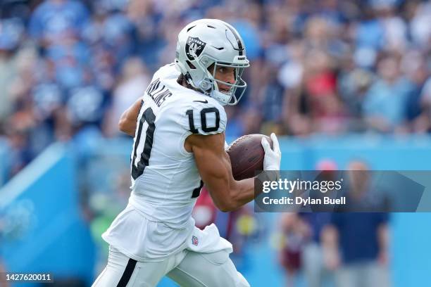 Mack Hollins of the Las Vegas Raiders runs with the ball in the first quarter against the Tennessee Titans at Nissan Stadium on September 25, 2022 in...