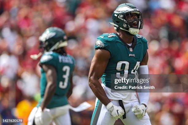 Defensive end Josh Sweat of the Philadelphia Eagles celebrates a sack on quarterback Carson Wentz of the Washington Commanders during the first...