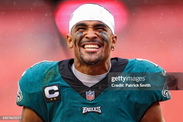 Quarterback Jalen Hurts of the Philadelphia Eagles celebrates after defeating the Washington Commanders at FedExField on September 25, 2022 in...