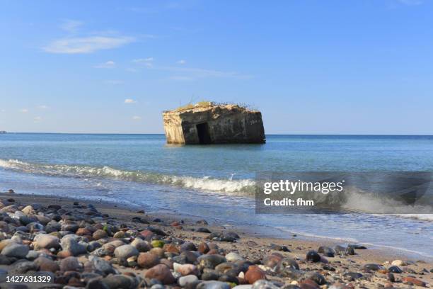 remains of an old bunker in baltic sea - geisterstadt stock-fotos und bilder