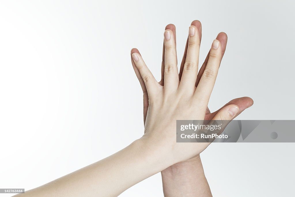 Man and woman touching hands