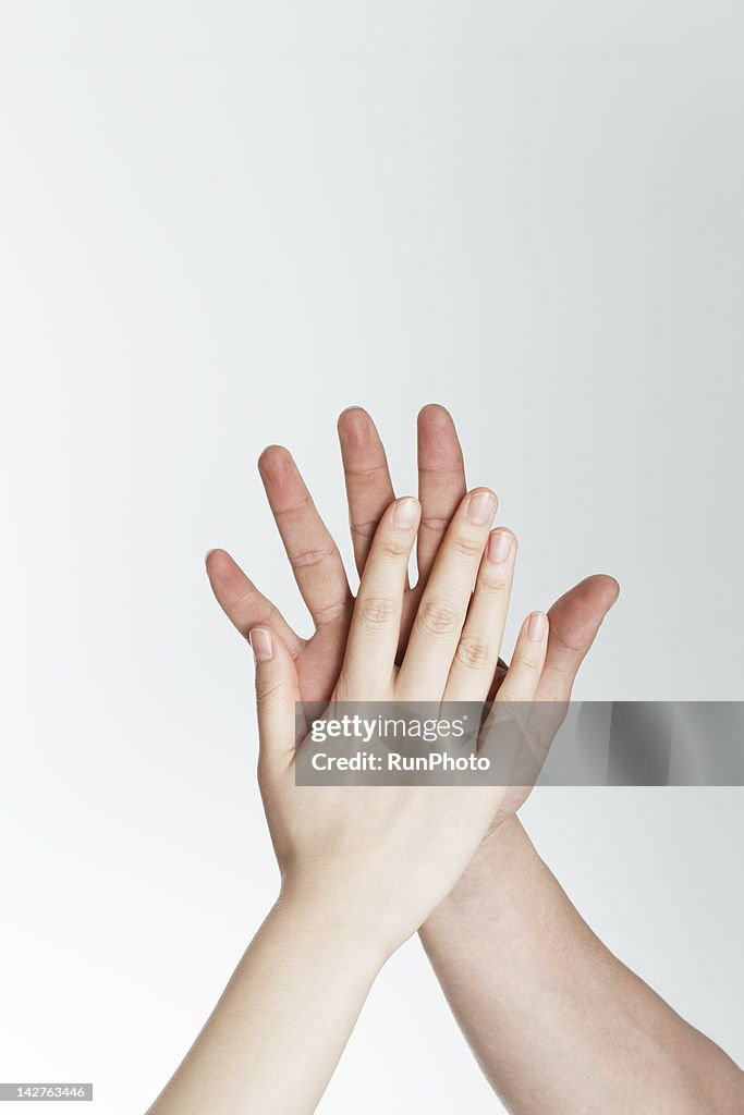 Man and woman touching hands