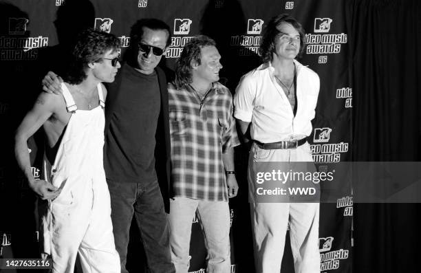 Eddie Van Halen, Alex Van Halen, Wolfgang Van Halen and David Lee Roth of the rock band Van Halen attend the MTV Music Awards at Radio City Music...