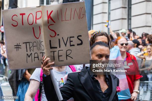 Participant in the Pride in London parade holds a Transgender Lives Matter sign on 1 July 2023 in London, United Kingdom. Over a million people...