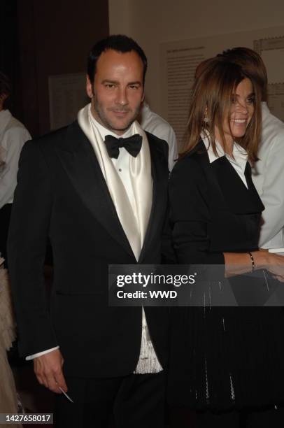 Designer Tom Ford, left, and Carine Roitfeld attend the Metropolitan Museum of Art's annual Costume Institute gala in New York City. The evening...