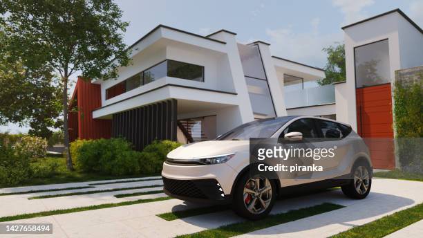 auto parcheggiata di fronte a una casa moderna - car in driveway foto e immagini stock