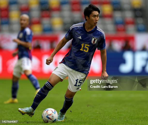 Daichi Kamada of Japan runs with the ball during the international friendly match between Japan and United States at Merkur Spiel-Arena on September...