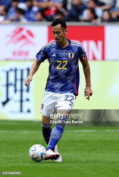 Maya Yoshida of Japan runs with the ball during the international friendly match between Japan and United States at Merkur Spiel-Arena on September...