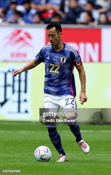 Maya Yoshida of Japan runs with the ball during the international friendly match between Japan and United States at Merkur Spiel-Arena on September...