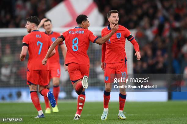 Mason Mount of England celebrates with teammate Jude Bellingham after scoring their side's second goal during the UEFA Nations League League A Group...