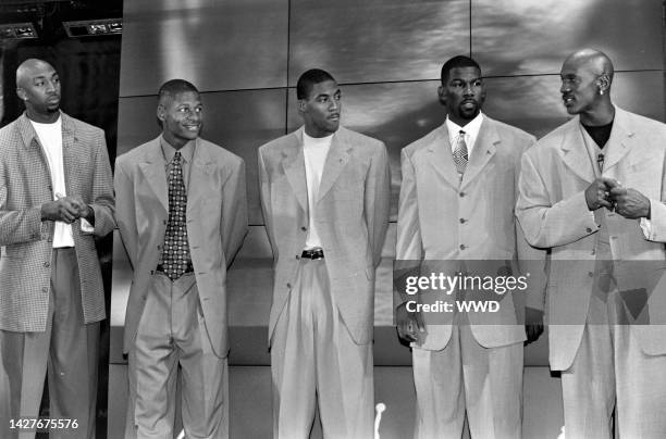 Basketball players Vin Baker, Ray Allen, Eddie Jones, Michael Finley and Michael Jordan onstage during the event. Basketball player Michael Jordan...