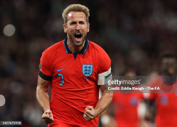 Harry Kane of England celebrates after scoring their team's third goal from the penalty spot during the UEFA Nations League League A Group 3 match...