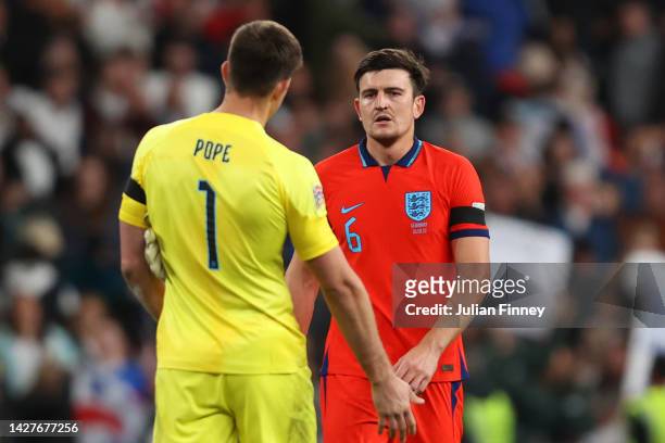 Harry Maguire and Nick Pope of England look on following the UEFA Nations League League A Group 3 match between England and Germany at Wembley...