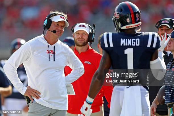 Head coach Lane Kiffin of the Mississippi Rebels looks at Jonathan Mingo of the Mississippi Rebels during the game against the Tulsa Golden Hurricane...