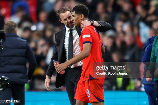 Head Coach Gareth Southgate with Jude Bellingham of England after their sides 3-3 draw during the UEFA Nations League League A Group 3 match between...