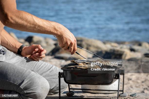 Man Frying Fish Man Frying Fish Photos and Premium High Res Pictures - Getty Images