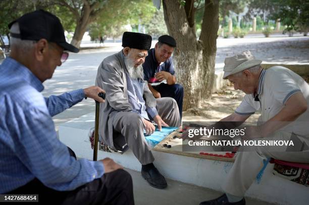 Pensioners play backgammon in Turkmenistan's capital of Ashgabat on June 30, 2023. The ex-Soviet Central Asian nation is one of the most secluded...