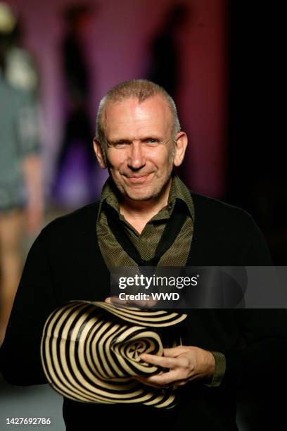 Fashion designer Jean Paul Gaultier on the runway after his spring 2009 menswear show in Paris.