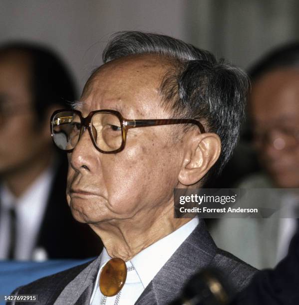 Close-up of Chinese royal Bu Jie during a press conference, Beijing, China, 1992. Pujie was the younger brother of China's last emperor, Puyi.