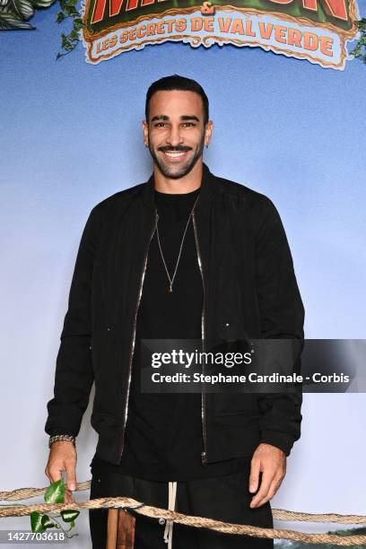 Adil Rami attends the "Jack Mimoun Et Les Secrets De Val Verde" Premiere at Le Grand Rex on September 26, 2022 in Paris, France.