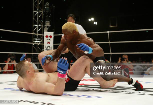 Kevin Randleman battles Mirko Cro Cop inside Saitama Super Arena on April 25, 2004 in Saitama, Japan.