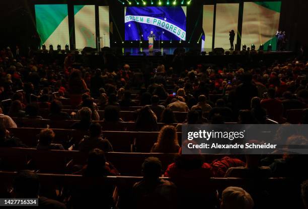 Brazil's former president and current presidential candidate Luiz Inacio Lula da Silva speaks to supporters during a gathering with artists,...