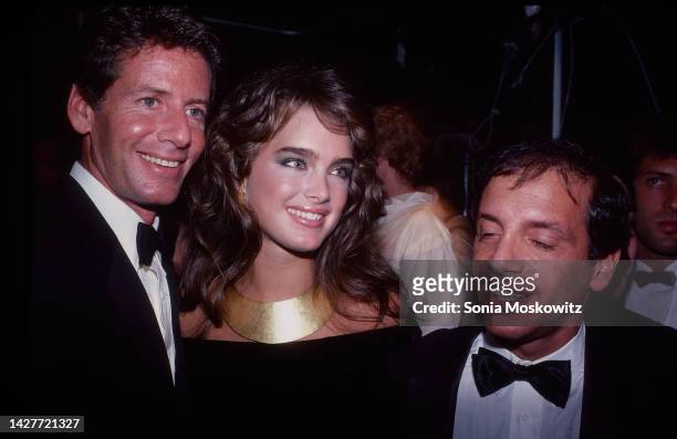 View of, from left, American fashion designer Calvin Klein, actor & model Brooke Shields Brooke Shields, and businessman & nightclub owner Steve...
