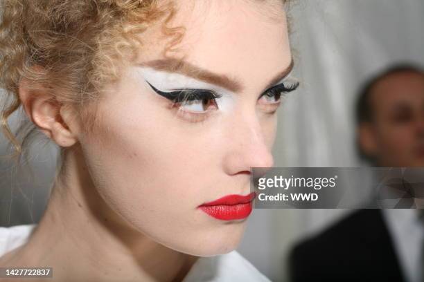 Model backstage Christian Dior's fall 2009 haute couture runway show in Paris.