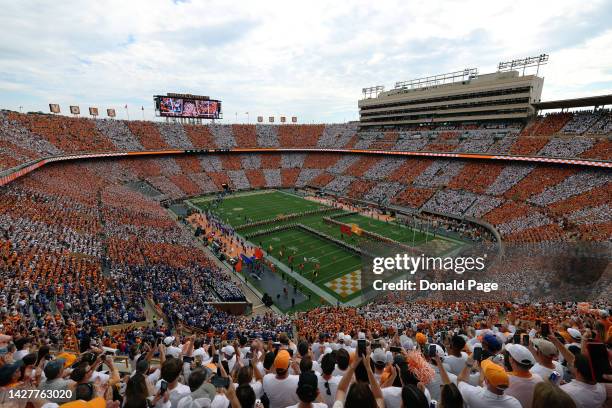 General view of the Tennessee Volunteers team running through the 'T' before the game against the Florida Gators at Neyland Stadium on September 24,...