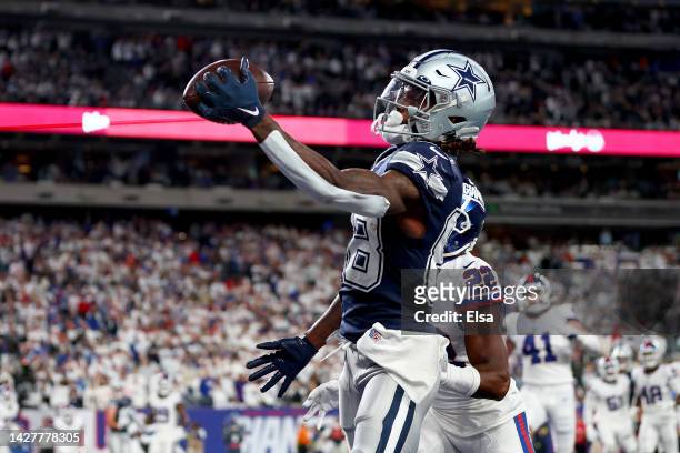 CeeDee Lamb of the Dallas Cowboys catches a 1 yard touchdown pass against the New York Giants during the fourth quarter in the game at MetLife...