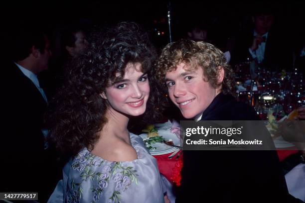 Portrait of American actors Brooke Shields and Christopher Atkins as they attend the 'Night of 100 Stars' benefit at Radio City Music Hall, New York,...