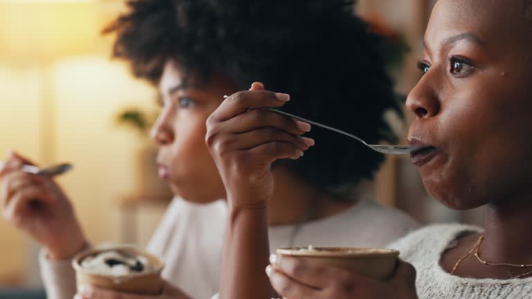https://media.gettyimages.com/id/1427796562/video/relax-ice-cream-and-lesbian-couple-eating-together-on-the-weekend-to-bond-while-watching-tv.jpg?b=1&s=640x640&k=20&c=SgVlbpwfpadEtUv6MS0OZpafjzOyPDaHbmDkviqO_RE=