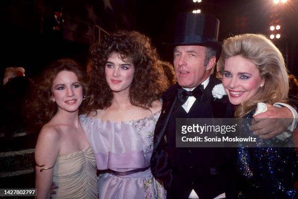 Portrait of, from left, American actors Melissa Gilbert, Brooke Shields, James Caan , and Priscilla Barnes as they attend the 'Night of 100 Stars'...