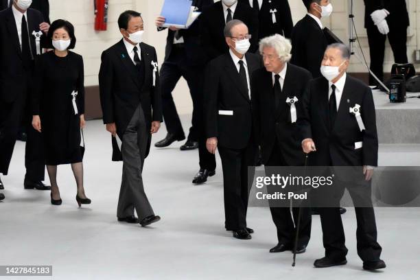 Former Prime Ministers of Japan Yoshiro Mori , Junichiro Koizumi, Yasuo Fukuda and Taro Aso arrive during the state funeral for Japan's former prime...