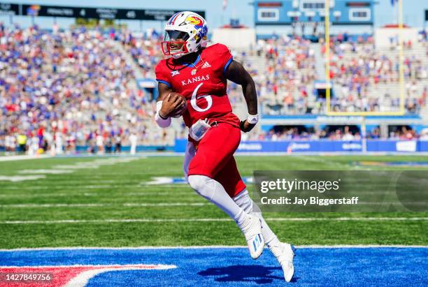 Jalon Daniels of the Kansas Jayhawks runs for a touchdown during the second half against the Duke Blue Devils at David Booth Kansas Memorial Stadium...