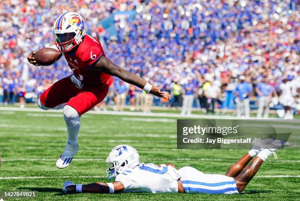 Jalon Daniels of the Kansas Jayhawks runs for a touchdown against Chandler Rivers of the Duke Blue Devils during the second half at David Booth...