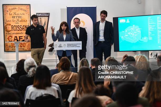 Paris mayor Anne Hidalgo delivers a speech flanked by President of the Paris 2024 Organising Committee for the Olympic and Paralympic Games, Tony...