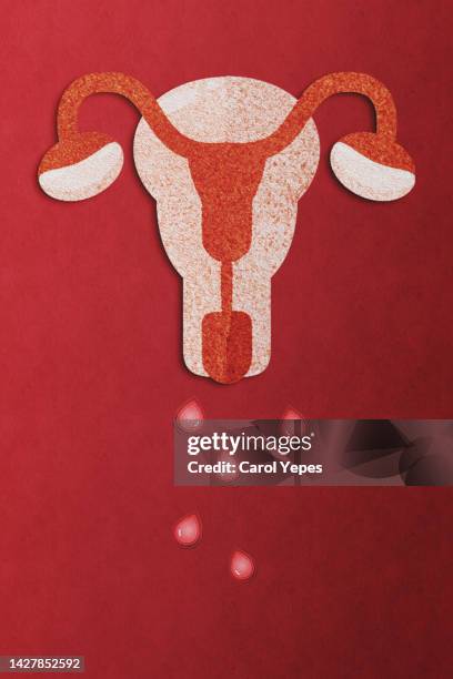 uterus un paper work. bleeding red background - cervical cancer stock pictures, royalty-free photos & images