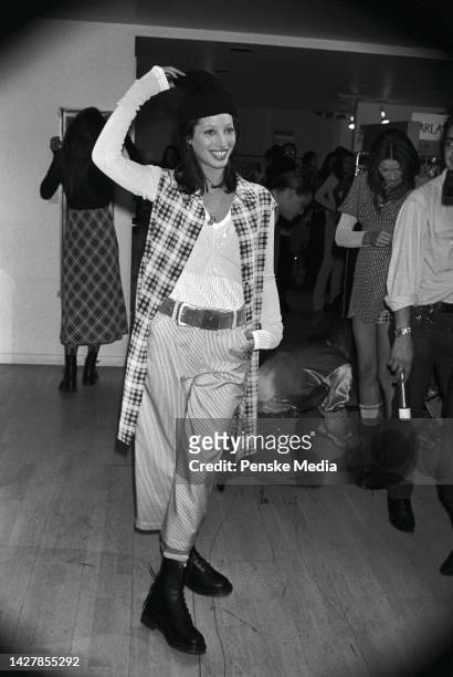 Photo by Kyle Ericksen/Penske Media/REX/Shutterstock .Model Christy Turlington backstage at the Perry Ellis Spring/Summer 1993 show in New York...