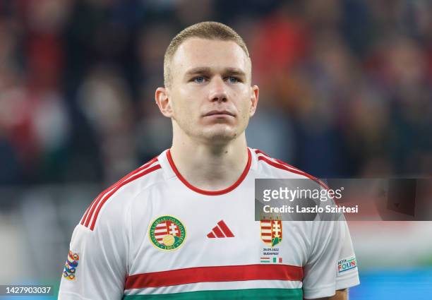 Attila Szalai of Hungary listens to the Italian anthem prior to the UEFA Nations League League A Group 3 match between Hungary and Italy at Puskas...