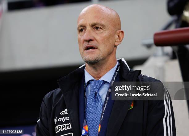 Marco Rossi, Manager of Hungary sings the Italian anthem prior to the UEFA Nations League League A Group 3 match between Hungary and Italy at Puskas...