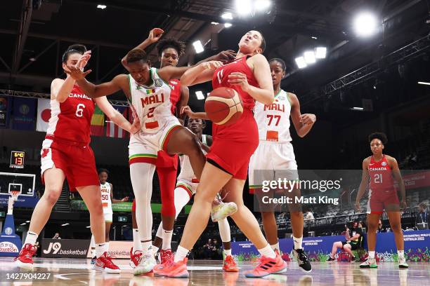 The arm of Salimatou Kourouma of Mali comes in contact with the face of Natalie Achonwa of Canada during the 2022 FIBA Women's Basketball World Cup...