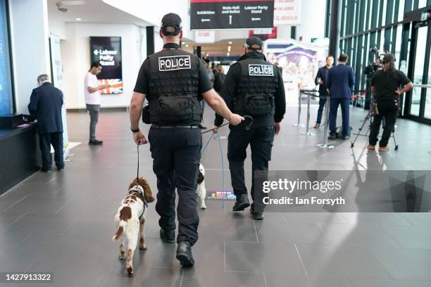 Police sniffer dogs carry out routine security checks at Liverpool ACC on the third day of the Labour Party conference on September 27, 2022 in...