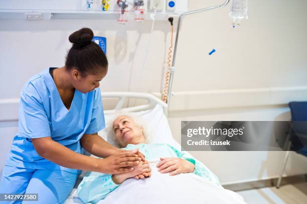 Conoling 1,949 Nurse Sitting On Hospital Bed Stock Photos, High-Res Pictures ...
