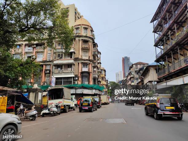 city street by buildings against sky - mumbai financial district stock pictures, royalty-free photos & images