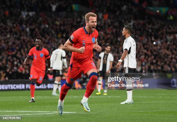 Harry Kane of England celebrates after scoring their team's third goal from the penalty spot during the UEFA Nations League League A Group 3 match...